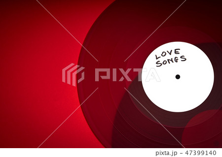 Valentines Day background with red LP record with love songs on red background 47399140