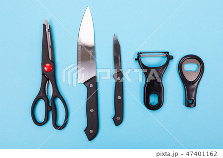 Kitchen utensils isolated on blue background Kitchen utensils isolated on blue background 47401162
