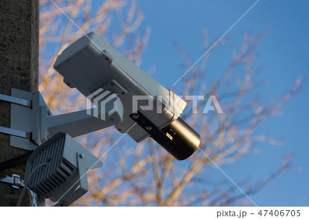 Security camera on the blue wall in day 47406705