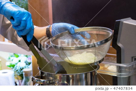 Chef cooking food in the kitchen, preparing food 47407834