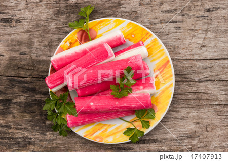 Crab sticks on the rustic wooden table 47407913