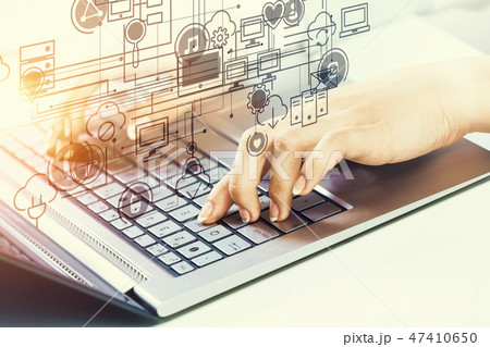 Woman typing on keyboard 47410650