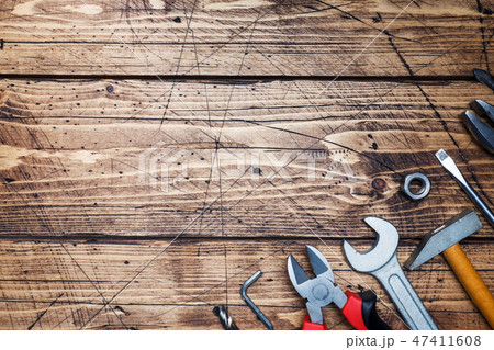 Set of different repair tools on wooden background Set of different repair tools on wooden background 47411608