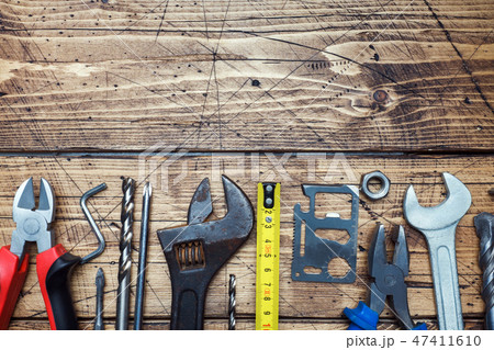 Set of different repair tools on wooden background 47411610