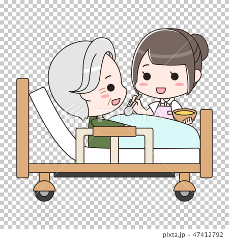 A female caregiver assisting a senior male meal A female caregiver assisting a senior male meal 47412792