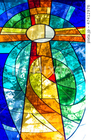 Stained glass cross in bright vivid colors Stained glass cross in bright vivid colors 47412976