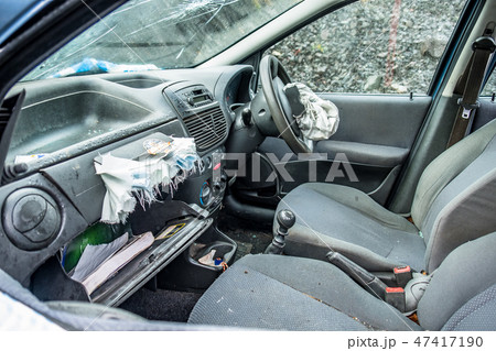 Total loss car with exploded airbag and broken windscreen Total loss car with exploded airbag and broken windscreen 47417190