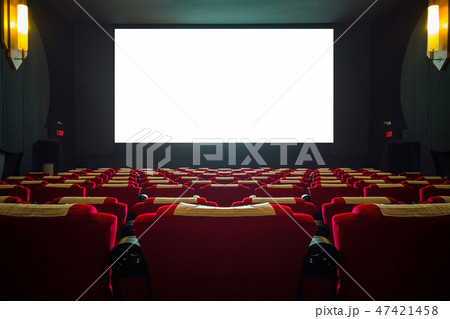 Cinema hall with red seat and wide white screen 47421458