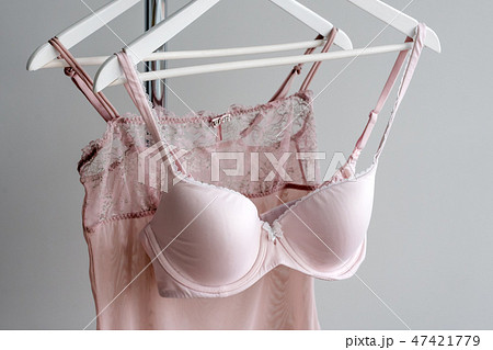 Vareity of pink bra hanging on a hanger. Textile, Underwear. Female bra in lingerie underwear store 47421779