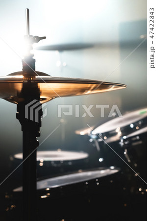 Close-up Drum set in a dark room against the backdrop of the spotlight. Atmospheric background Close-up Drum set in a dark room against the backdrop of the spotlight. Atmospheric background 47422843