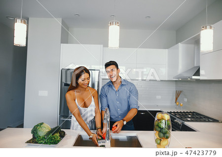 pretty couple in a kitchen 47423779