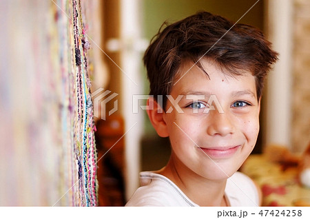 Boy sitting in the kitchen waiting for lunch Boy sitting in the kitchen waiting for lunch 47424258
