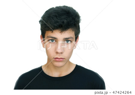 A teenager in a black shirt on a white background A teenager in a black shirt on a white background 47424264