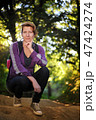 Beautiful woman relax in the park after sport race 47424274