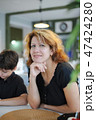 Beautiful woman ordered food in the cafe and rest 47424280