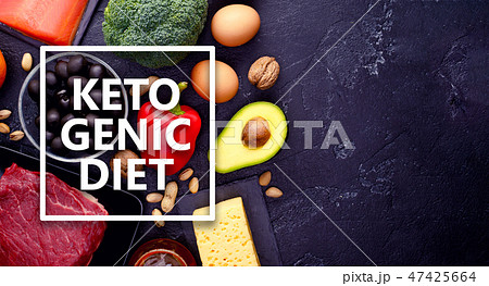 Photo of products for diet on black stone table , Ketogenic diet concept. 47425664