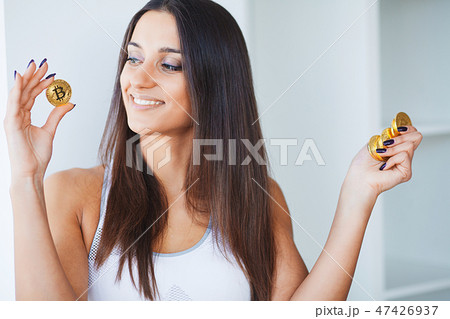 Beautiful Woman in Underwear. Close up Concept. Young Woman With a Bitcoin Cryptocurrency Beautiful Woman in Underwear. Close up Concept. Young Woman With a Bitcoin Cryptocurrency 47426937
