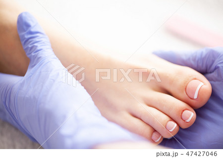Pedicure Day. Pedicure Specialist Works With the Patient in Spa Salon Pedicure Day. Pedicure Specialist Works With the Patient in Spa Salon 47427046