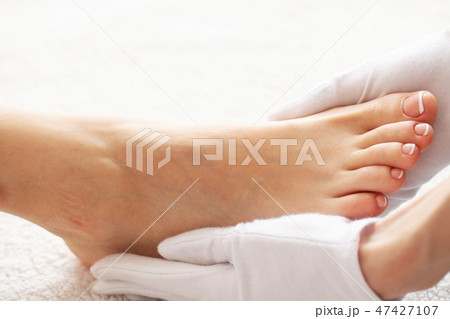 Pedicure Day. Pedicure Specialist Works With the Patient in Spa Salon Pedicure Day. Pedicure Specialist Works With the Patient in Spa Salon 47427107