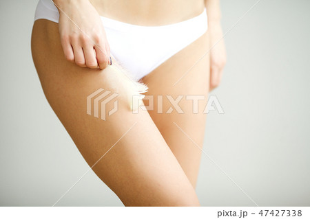 Long Woman Legs With Beautiful Soft Skin. Beauty Body Care 47427338