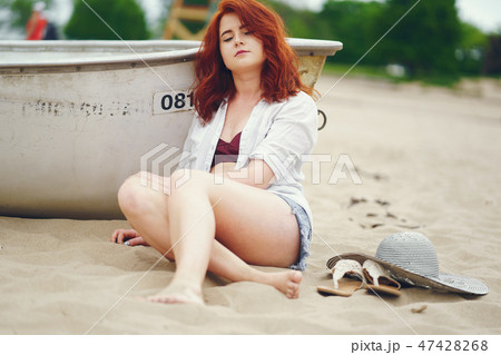 pretty girl in a beach 47428268