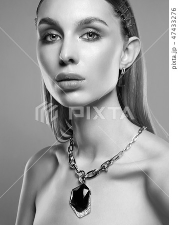 jewelry on beautiful girl. young blonde woman 47433276