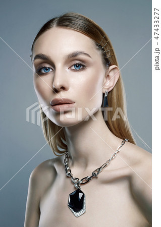 jewelry on beautiful girl. young blonde woman 47433277