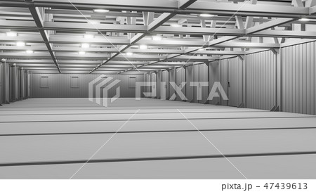 Empty commercial warehouse with bright lamps 47439613