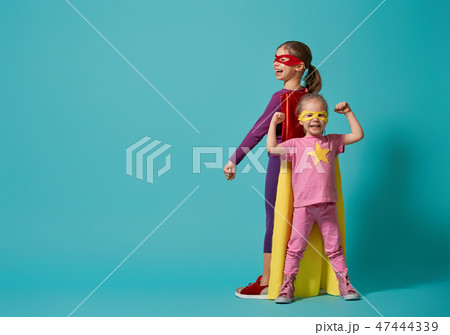 children playing superhero 47444339