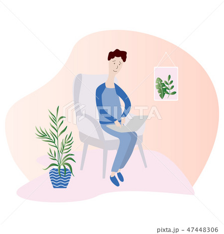 Young men with notebook and cat on chair at home. Young men with notebook and cat on chair at home. 47448306