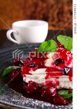 Meringue with cherry and strawberry jam Meringue with cherry and strawberry jam 47449072