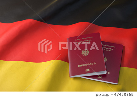 Passport of Germany on the flag of the Germany Passport of Germany on the flag of the Germany 47450369