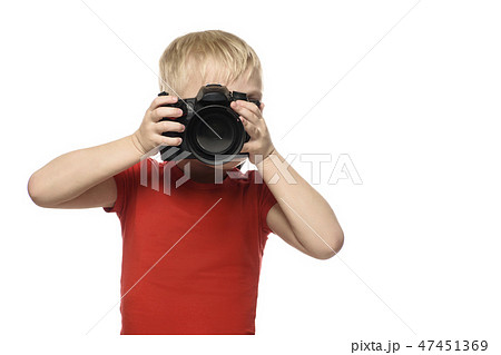 Young blond boy with camera. Portrait, isolated Young blond boy with camera. Portrait, isolated 47451369