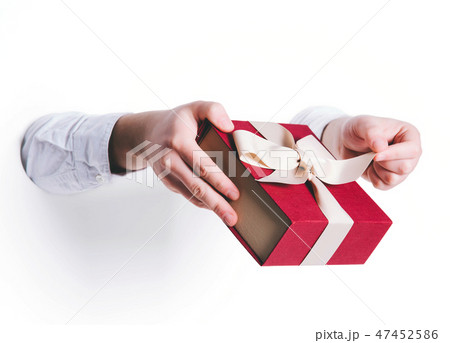 Man holding a gift box. Man holding a gift box. 47452586