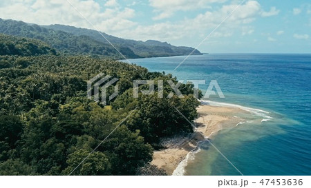 remote south pacific island with sandy beach shore 47453636