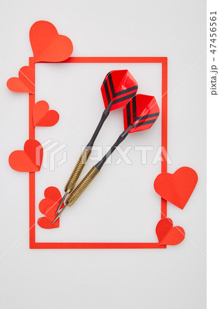 Valentine's day red darts and paper heart Valentine's day red darts and paper heart 47456561