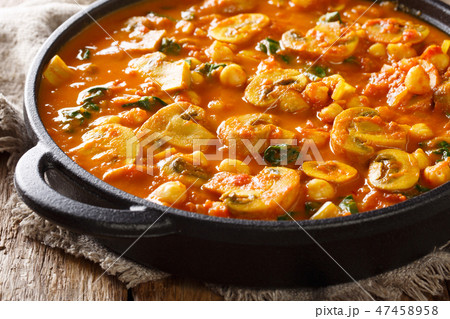 Freshly cooked mushroom curry with spinach 47458958