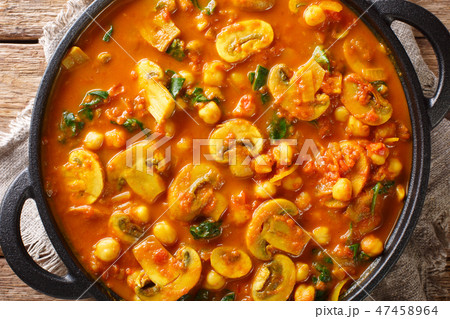 Freshly cooked mushroom curry with spinach Freshly cooked mushroom curry with spinach 47458964