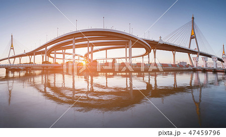 Sunset over twin bridge and highway 47459796