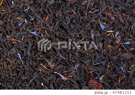 Black tea with slices of dried cherry, safflower petals for your unique project. Black tea with slices of dried cherry, safflower petals for your unique project. 47461151