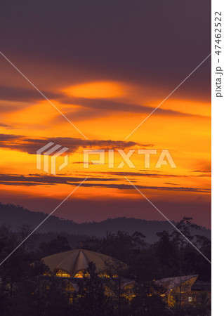 Dramatic orange and purple sunset in the mountains Dramatic orange and purple sunset in the mountains 47462522