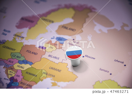 Russia marked with a flag on the map 47463271
