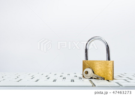 Background image of metal lock on keyboard 47463273