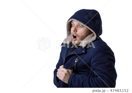 Smiling young man in winter warm coat. Smiling young man in winter warm coat. 47465152