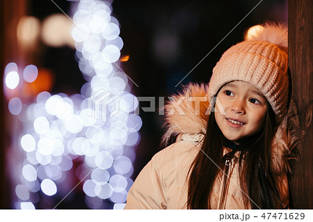 portrait of cute smiling little girl in a knitted hat outdoor portrait of cute smiling little girl in a knitted hat outdoor 47471629
