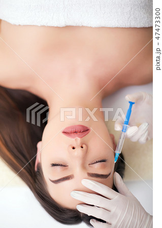 Beautiful woman gets injections. Cosmetology. Beauty Face Beautiful woman gets injections. Cosmetology. Beauty Face 47473300