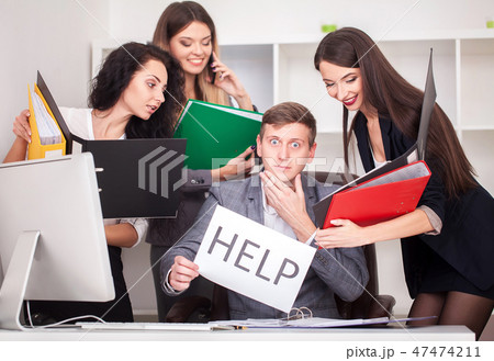 frustrated attractive businessman in her 20s holding help sign desparate suffering stress overworked 47474211