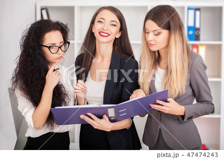 A group of successful businessmen. Discussion of the important contract of the company. 47474243