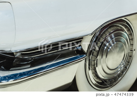 fragment of of body of a white vintage car 47474339