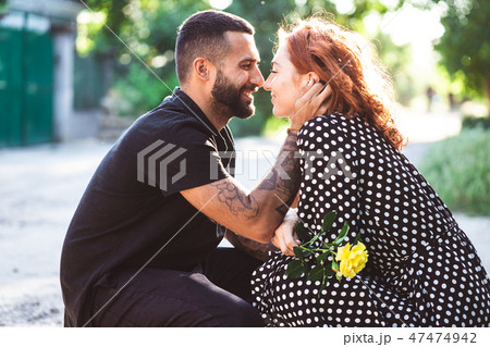 guy and girl are resting in the park 47474942